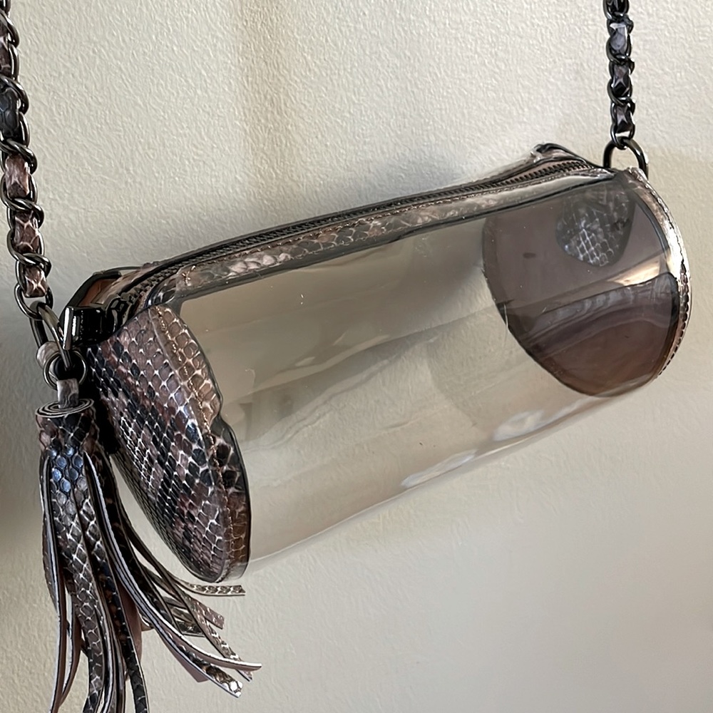 Clear cross-body bag for Game Day! Faux snake-skin on ends and adjustable strap.